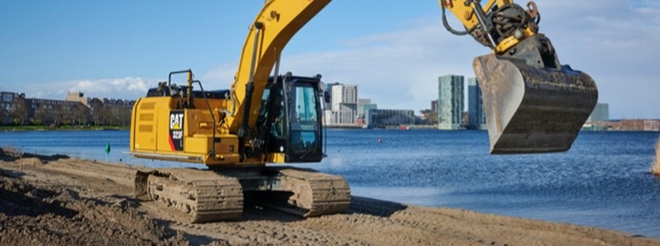 Graafmachine aan het water
